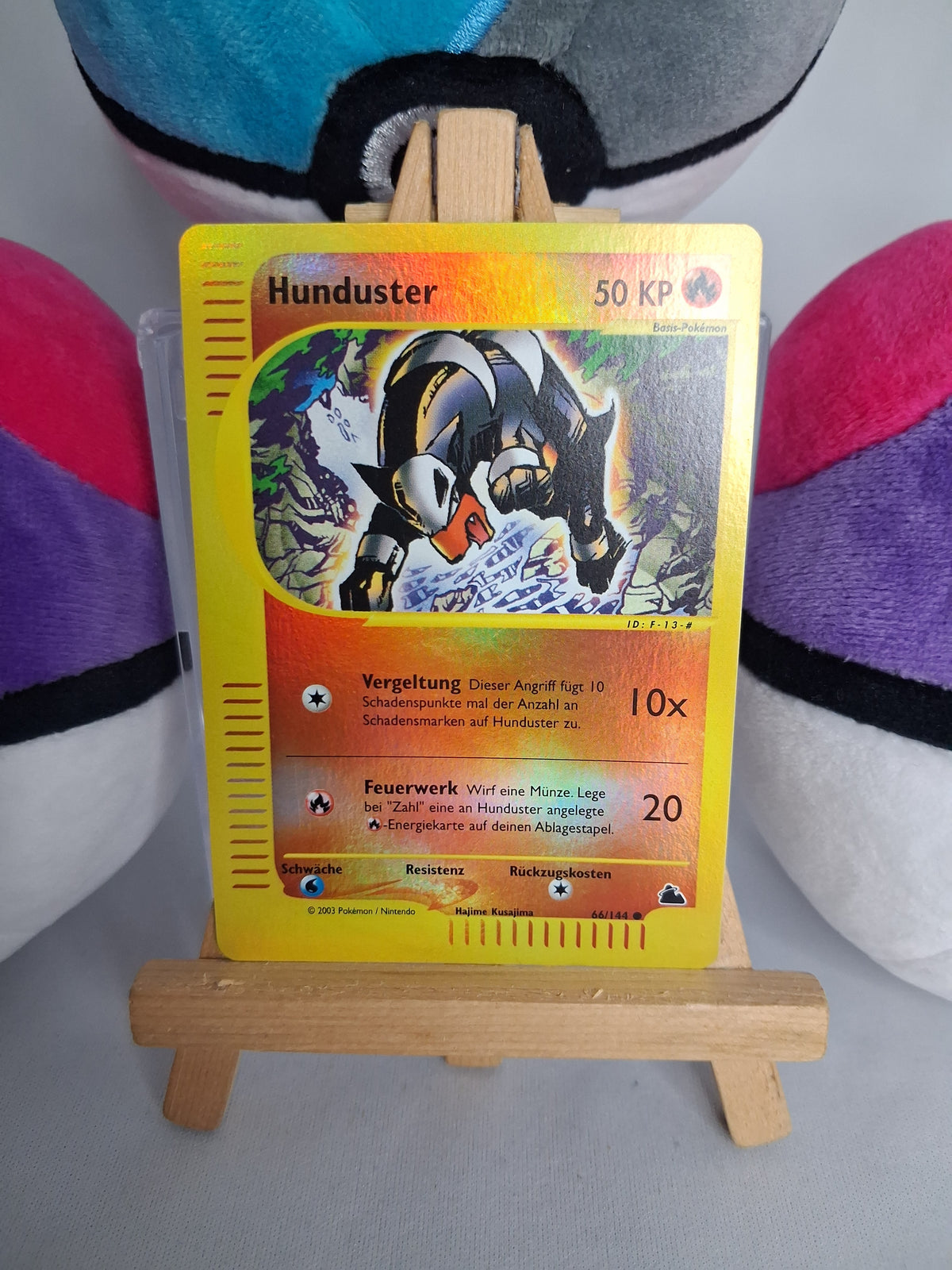 hunduster-skyridge-de-66-144-reverse-holo-nm